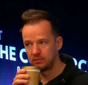 Marek Marek seated playing high stakes cash game poker on the Bally Live Poker livestream.