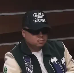 Tommy 2 Tommy seated playing low stakes cash game poker on the Champions Poker Live stream.