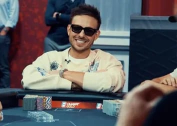 Sam Kiki seated playing high stakes cash game poker on PokerGO